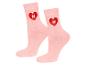 Twee roze sokken met een rood hart met een puzzelstukje erop.