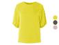 Een gele blouse met korte mouwen.