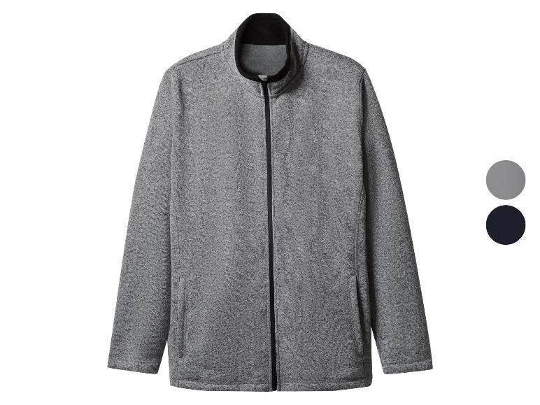 Grijze jas met rits en hoge kraag, met zijzakken en kleuropties.