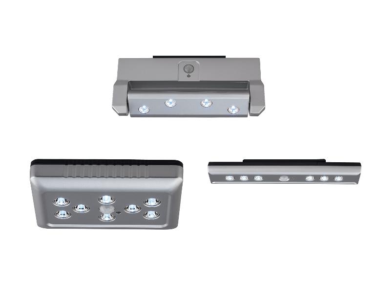 Drie aanzichten van een zilveren LED-lamp met bewegingssensor.