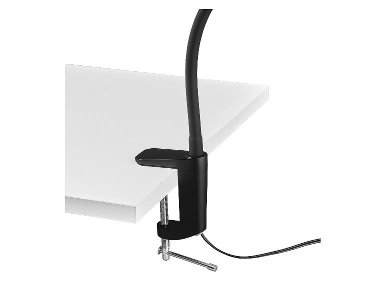 Zwarte bureaulamp met flexibele arm, vastgeklemd aan een wit tafelblad
