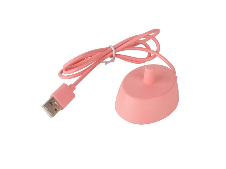 Roze oplaadstation met USB-kabel voor de Hello Kitty elektrische tandenborstel.