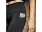 Zwarte leggings met een zakje voor een telefoon.