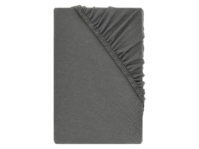 Grijs hoeslaken, opgevouwen