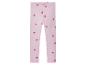 Roze leggings met hartjesprint.
