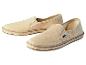 Twee paar beige canvas espadrilles.