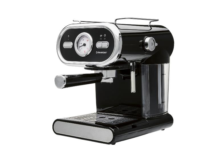 Zwart espressomachine met chromen details en een manometer.