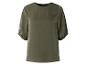 Een olijfgroene blouse met ballonmouwen.