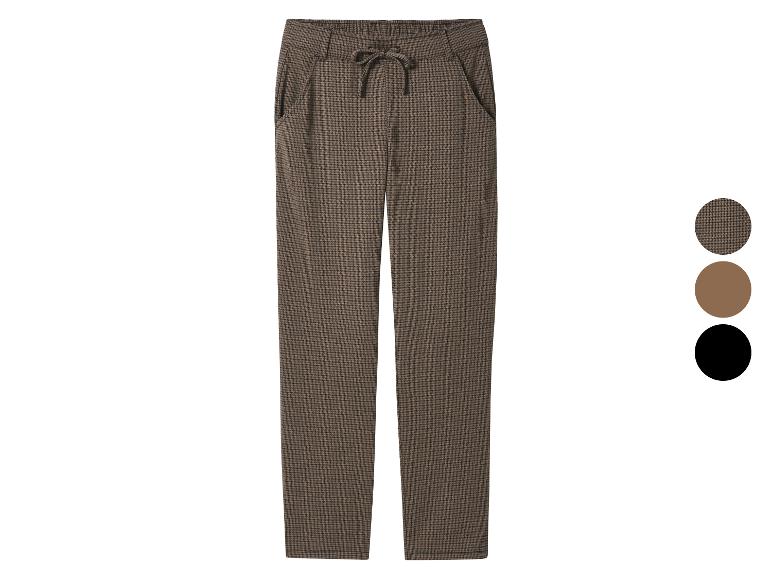 Bruine broek met pied-de-poule patroon en trekkoord in de taille.