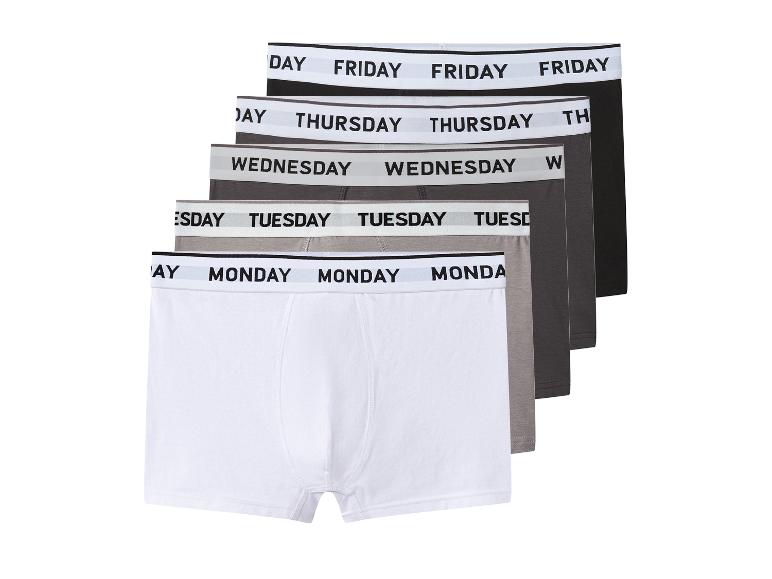 Vijf herenboxershorts in diverse kleuren met de dagen van de week op de tailleband.