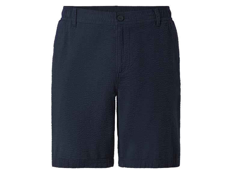 Donkerblauwe shorts van getextureerde stof.