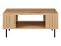 Houten salontafel met geribbelde details en zwarte poten