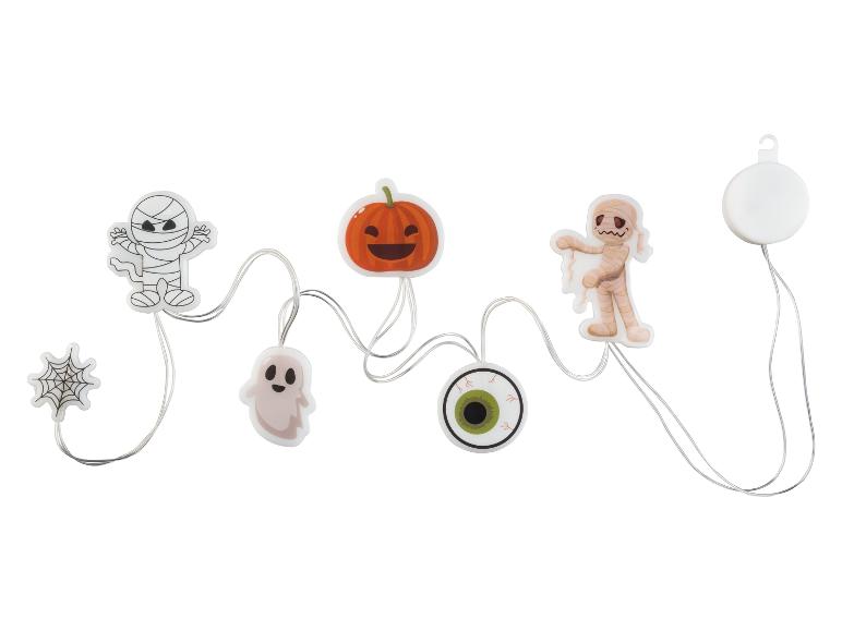 Halloween decoratieset met mummies, pompoen, spook, spinnenweb en oogbal.