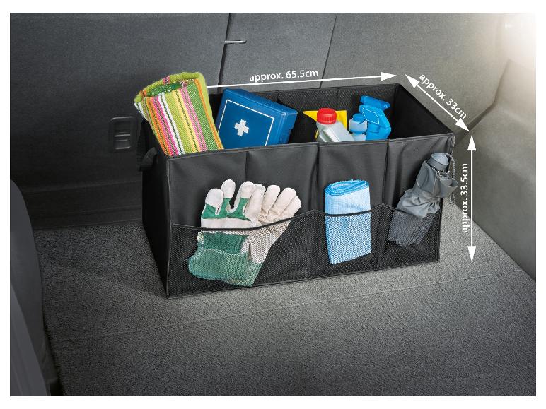 Organizer voor de kofferbak met vakken voor een handdoek, EHBO-doos en handschoenen.