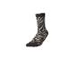 Sok met zebraprint in zwarte en beige tinten.
