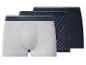 Drie herenboxershorts: één lichtgrijs, één donkerblauw met patroon en één effen donkerblauw.