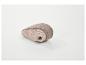 Opgevouwen beige schoenzool met gaasstof.