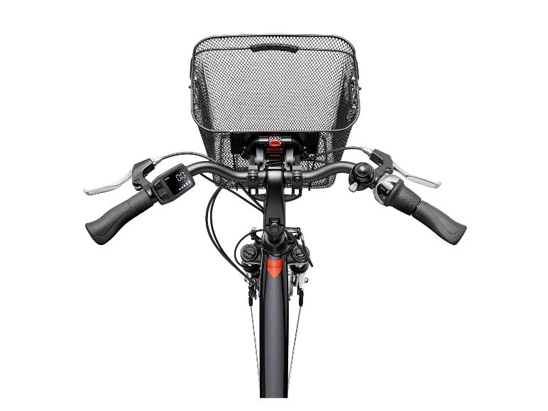 Bovenaanzicht van een e-bike stuur met voormand, display en versnellingshendel.