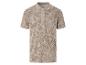 Beige polo shirt met tropische bladerprint.