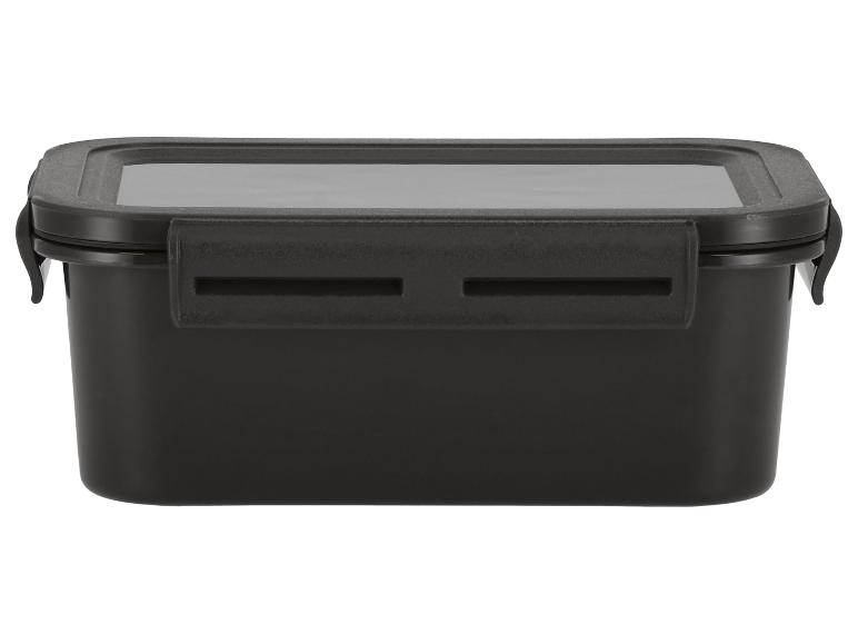 Zwarte rechthoekige lunchbox met transparant deksel en sluitingen