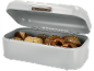 Witte broodtrommel met diverse broodjes en pretzels erin.