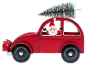 Rode speelgoedauto met kerstman en kerstboom op het dak