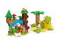 Een kleurrijke LEGO Duplo jungle set met een tijger, schildpadden, bomen en een bot.