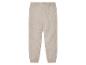 Beige gebreide broek.