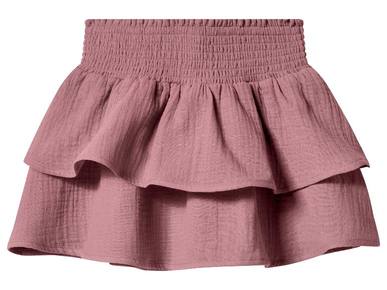 Roze rucheskirt met gesmokte tailleband.