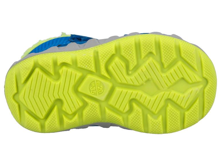 Onderkant van een blauw-gele kinderschoen met antislipzool.