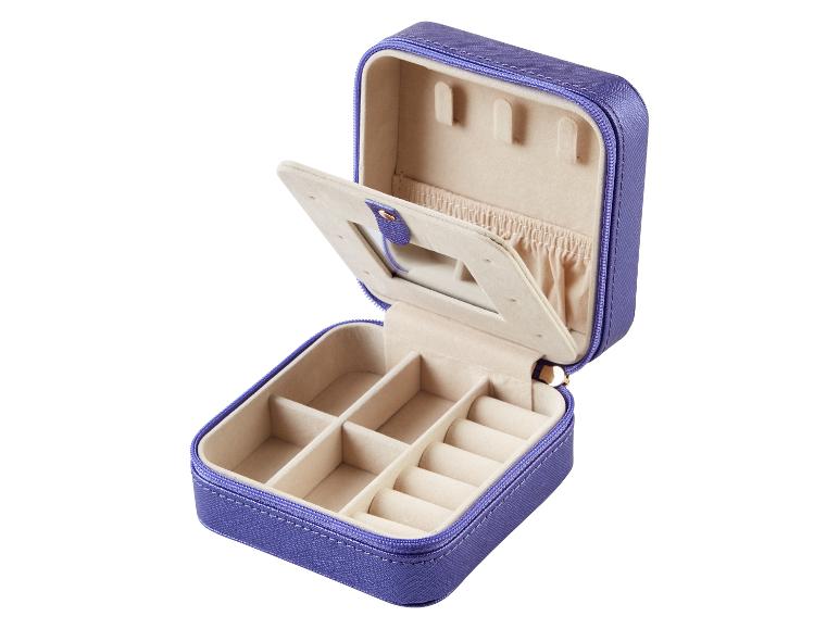 Paarse juwelendoos met vakjes voor ringen en oorbellen.