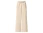 Beige wijde broek met elastische tailleband en trekkoord.
