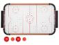 Airhockeytafel met rode pucks en scoretellers.