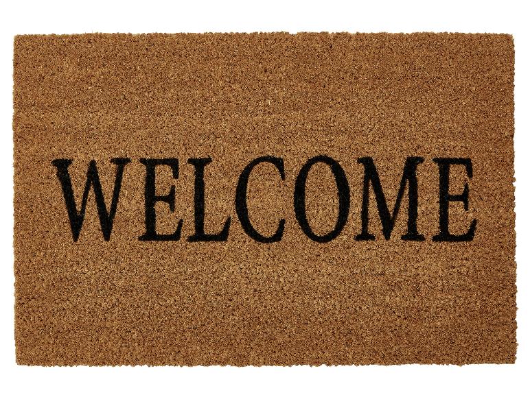 Een welkommat met de tekst 'WELCOME'.