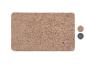 Beige badmat met logo en twee kleurmonsters aan de rechterkant.