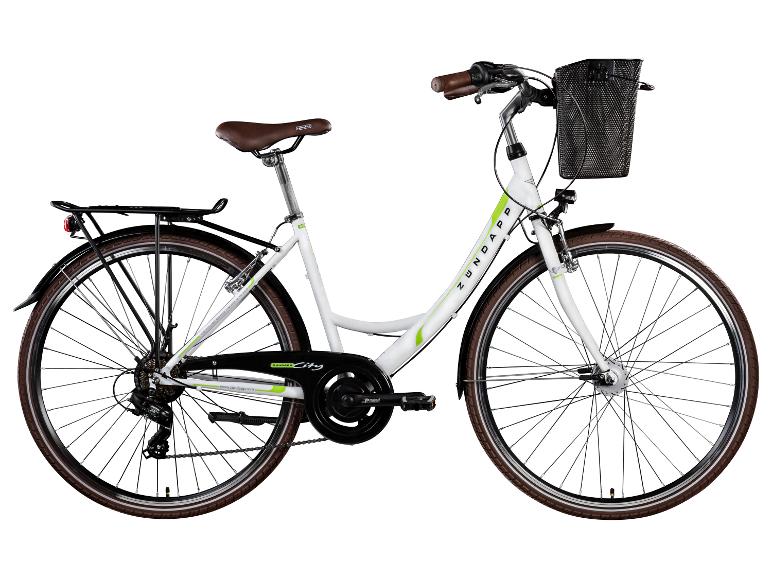 Een witte Zündapp City fiets met bruine banden, een mand en een bagagedrager.