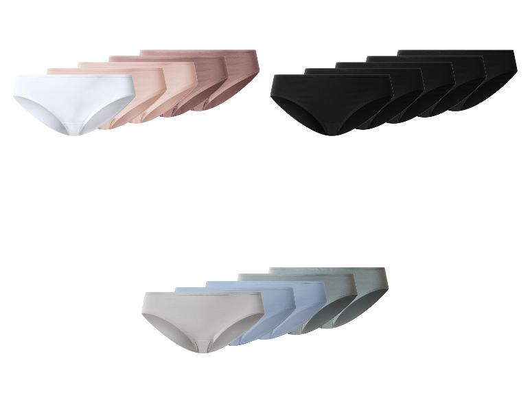 Sets damesonderbroeken in drie verschillende kleuren: wit, zwart en blauwgrijs.
