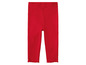 Rode gebreide leggings voor baby's.