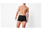 Man toont zwarte Esmara boxershorts.