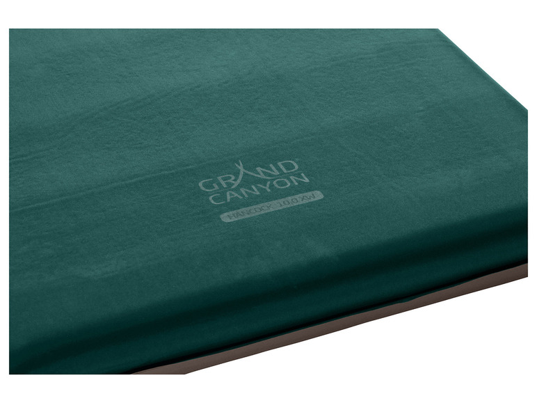 Een groene Grand Canyon slaapmat voor kamperen.