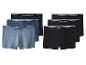 Zes paar herenboxershorts, drie blauwe en drie zwarte.