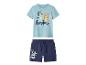Kinderkledingset met lichtblauw T-shirt en donkerblauwe korte broek, beide met cartoonfigurenprints.