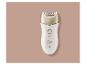 Witte epilator met gouden accenten op een beige achtergrond.