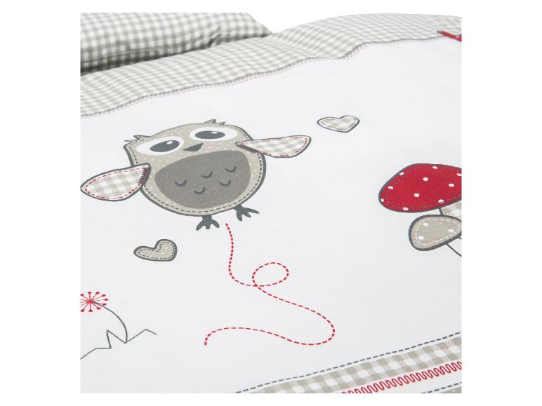 Kinderbeddengoed met uil, paddenstoelen en hartjes.