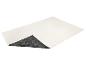 Gebroken wit badmatje met golvend patroon en donkergrijze antislip onderkant met bloemmotief.