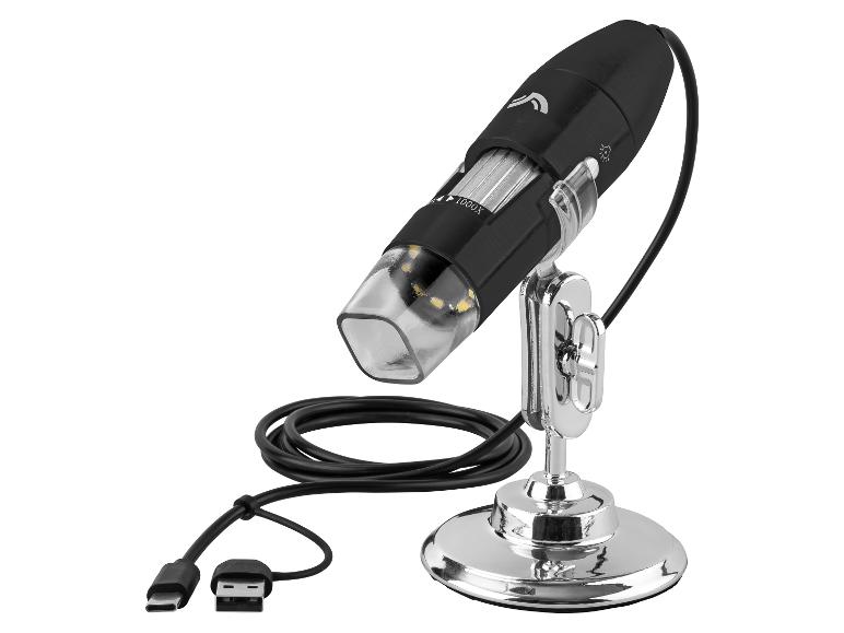 Zwarte USB digitale microscoop met chromen standaard en kabel.