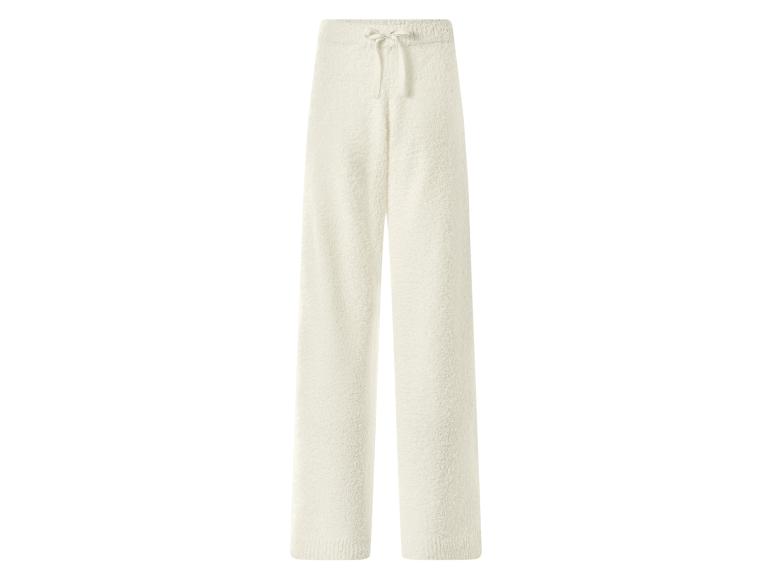 Crèmekleurige, pluizige joggingbroek met trekkoord in de taille.