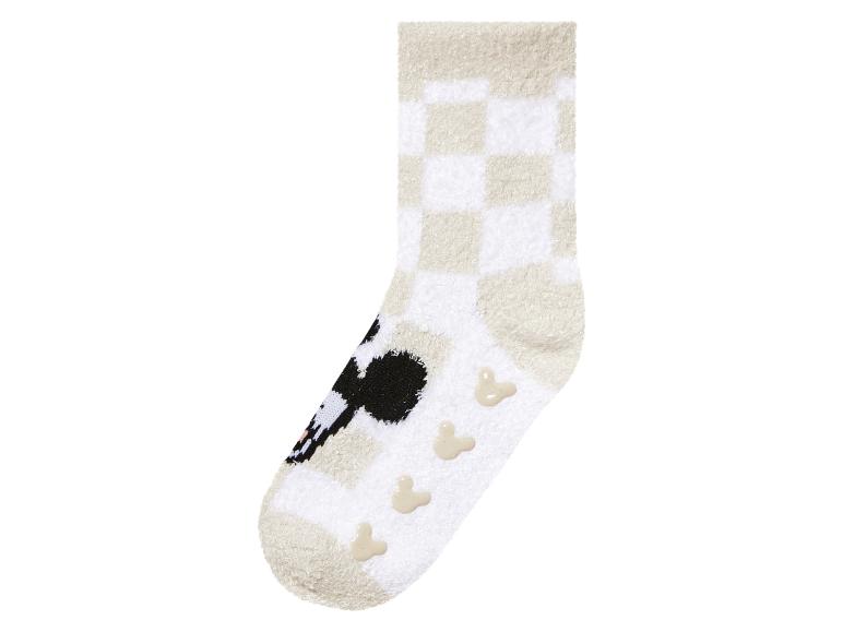 Witte en beige sokken met Mickey Mouse print en geruite patronen.