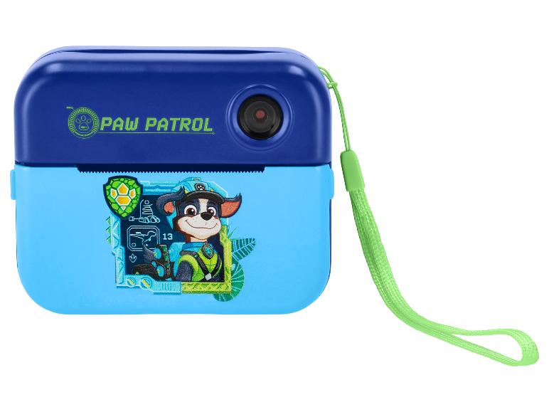 Blauwe digitale camera met een groene band en een stripfiguur