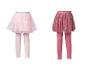 Twee sets kinderleggings en tule rokjes: lichtroze en donkerroze met zilveren stippen.